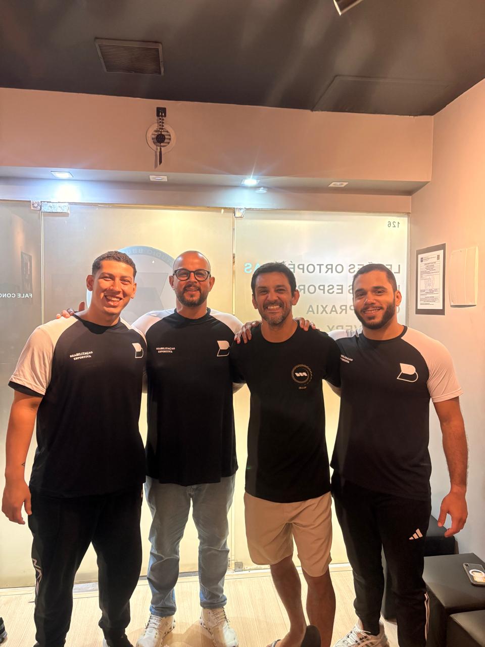 Equipe do Studio Bbuenno com atleta